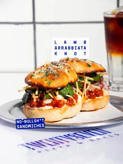 My sandwiches are anything but boring. This is the Lamb Arrabbiata Knot, packed with spicy lamb, whipped garlic yogurt, and fresh mint salad, all stuffed into our signature garlic knots. It's a full-on flavour experience.