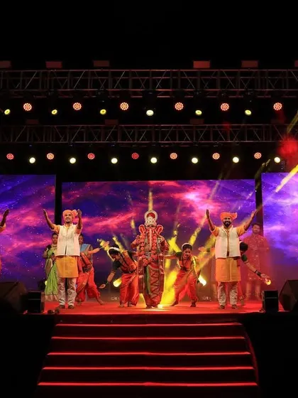 I love bringing cultural events to life. This stage for a new song release event features a multi-panel LED background, vibrant stage lighting, and a full sound system to support the traditional dancers and musicians.