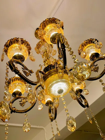 I'm obsessed with the lighting here. This chandelier at the GK-1 studio adds so much warmth and character.