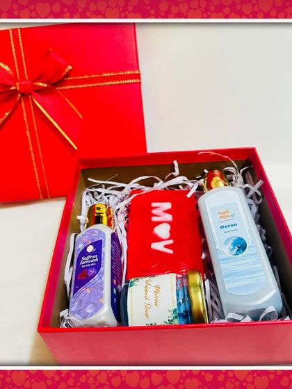 A custom Valentine's skincare hamper for him and her. This box includes Saffron Lavender bodywash, Ocean bodywash, a whipped soap, and a personalized initial soap bar.