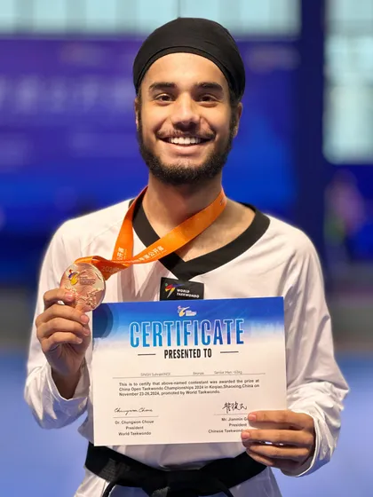 Suhrab with his Bronze medal from the China Open 2024. We are proud of his performance and his contribution to the team's success.