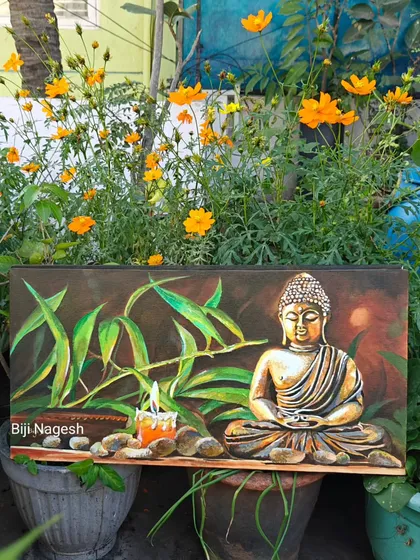 I find so much peace in painting Buddha, and this piece is special. I used a metallic finish that glows beautifully in candlelight, set against a backdrop of my own terrace garden flowers. It’s a piece of tranquility for your space.