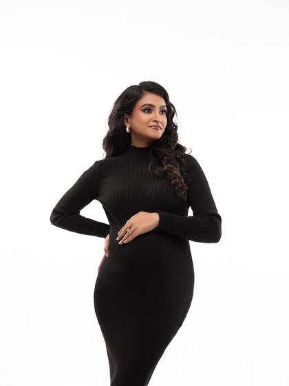 A confident and chic portrait. The black dress is a versatile piece from my client wardrobe that is both comfortable and incredibly flattering.