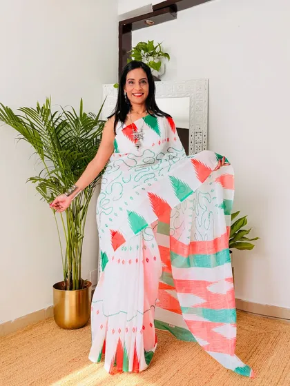 This tricolor cotton linen saree has a unique tie-dye pattern. It's a subtle and artistic way to show your patriotic spirit on Independence Day.