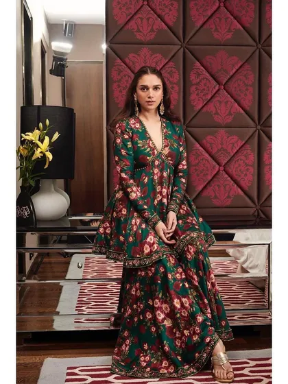 Another angle of the green floral sharara set, highlighting the deep V-neckline and beautiful print.