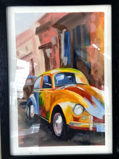A vibrant, colorful painting of a vintage car, created by a student who learned the techniques in our oil painting course.
