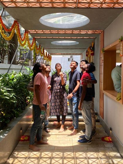 Our awesome team enjoying the spotlight under the skylights at our latest project handover.
