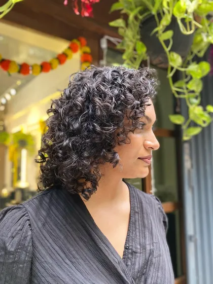 More examples of my short curly haircuts, from bobs to layered chops, each one personalized to the client's curl pattern and face shape.