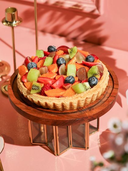 A fruitful dessert. Our fresh fruit tart is loaded with strawberries, blueberries, kiwi, and grapes on a bed of light pastry cream.