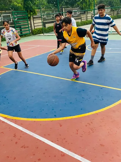 A player dribbles against a defender.