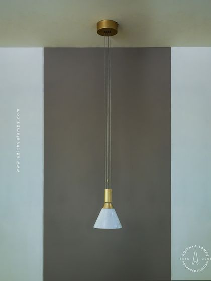 A full view of our single pendant light, showcasing its adjustable height and clean lines. This fixture is highly versatile, suitable for both residential and commercial applications where style is key.