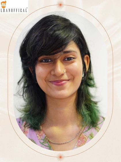 Embracing an eco-friendly vibe with a pop of green. This unique color and textured, layered cut create a sustainable and edgy fashion statement.