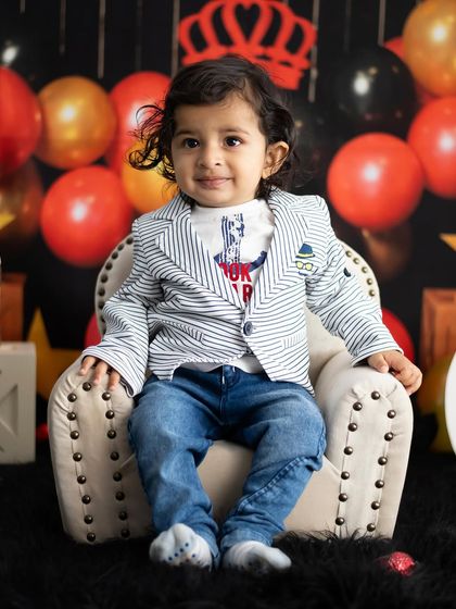 This little king is ready to celebrate his first birthday in style.