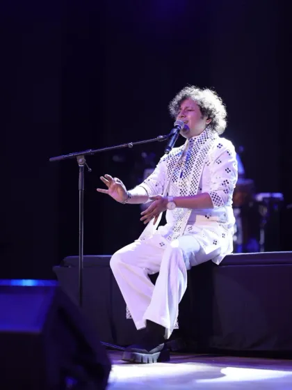 A seated, soulful performance during the Rotary Club event, showing our ability to adapt the energy to the event's needs.