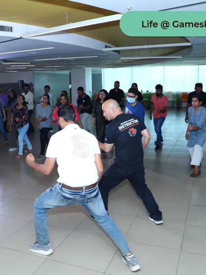 An interactive drill with employees at the Gameskraft corporate workshop.
