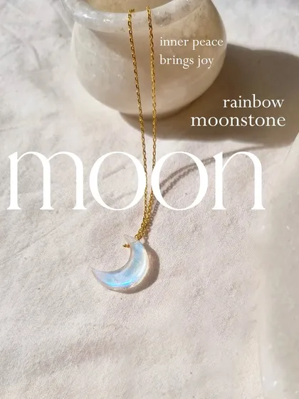 This is my rainbow moonstone crescent pendant, which has a beautiful blue flash called labradorescence. I use this particular stone to help bring inner peace, enhance creativity, and invite harmony and joy.