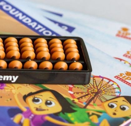 Our learning materials, including the abacus and colorful workbooks, are designed to be engaging and child friendly.