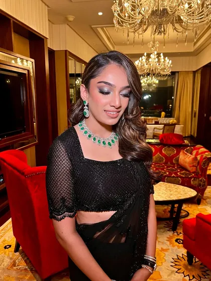 A close-up of the smokey eye and flawless skin for the Ambani Sangeet. The makeup is dramatic yet sophisticated, perfect for an evening of high-end celebration.