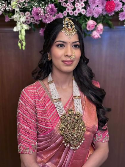 A timeless traditional glam look for a client attending her brother's engagement.