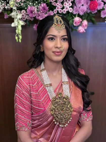 A timeless traditional glam look for a client attending her brother's engagement.