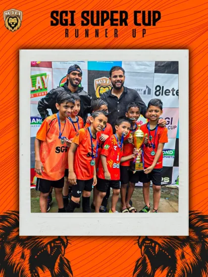 The joy of competition is what it's all about. Our young players and their coaches proudly pose as runners-up in the SGI Super Cup, a moment of achievement that fuels their passion for the game.
