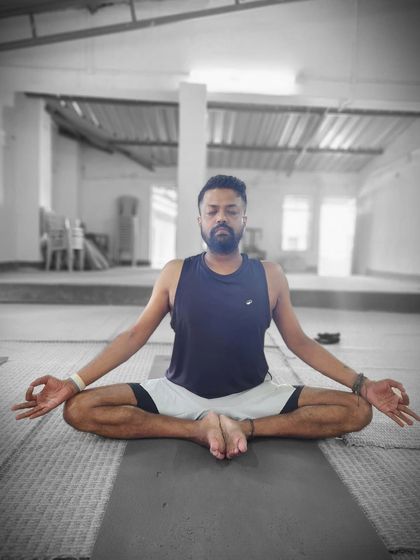 A participant deep in meditation. These moments of stillness are where the true transformation happens, allowing for deep inner connection and clarity.