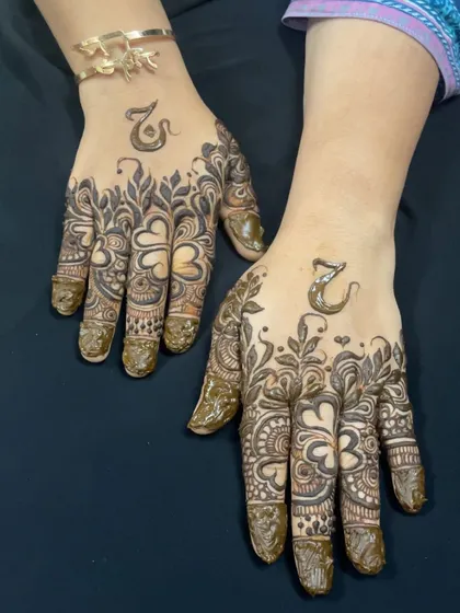 A beautiful design with the initial 'A' hidden among the leaves and hearts.