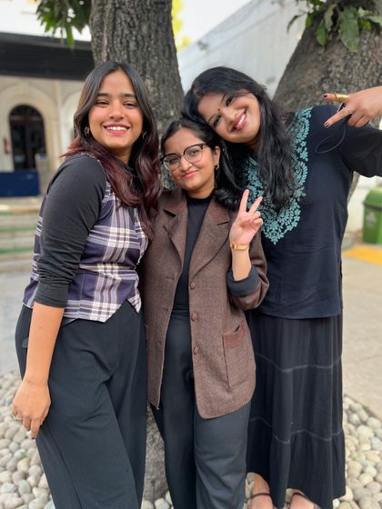 The joy of collaboration. Participants of the 'Verse & Voice' workshop posing together after a successful session, showcasing the friendships formed in our community.