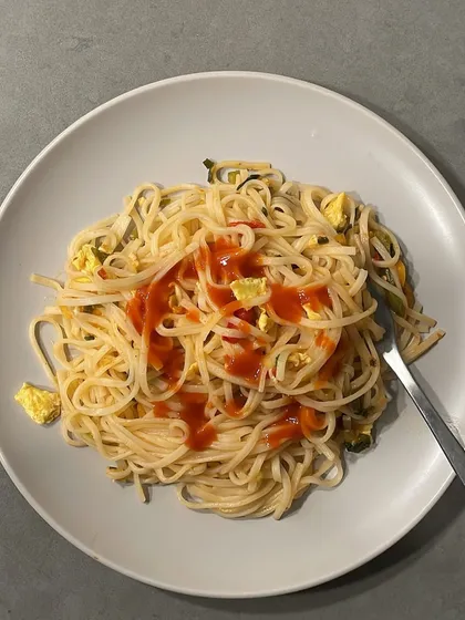 Yes, even sports nutritionists enjoy their food! This is what strategic carbo-loading looks like on vacation. A good nutrition plan is about balance and understanding how to fuel your body, not about restriction. Sometimes, a simple plate of noodles is exactly what you need.