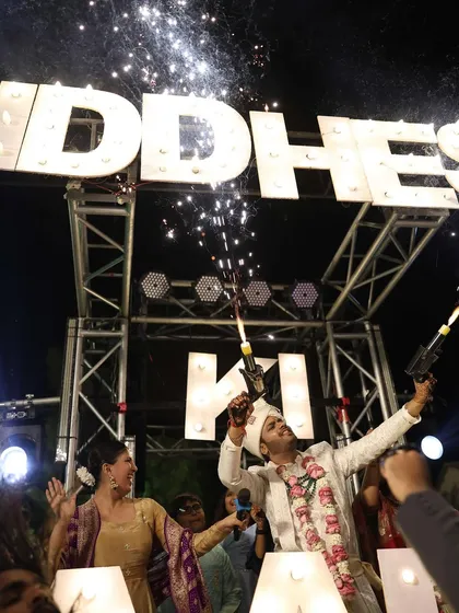 Another shot of the cold pyros creating a shower of sparks. These details make the baraat feel like a movie scene.