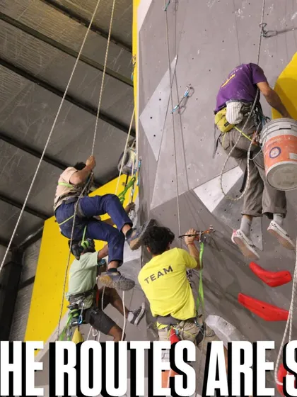 The routes are set. Our team, harnessed and ready, works high on the walls to prepare for the competition. This is where the magic begins.