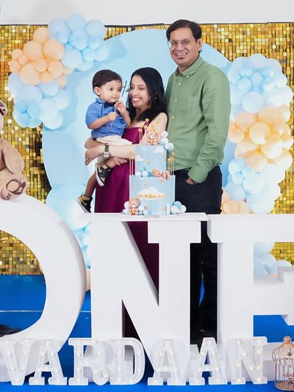 A thrilling 'Avengers' themed birthday party, with superhero cutouts, a cityscape backdrop, and dynamic balloon arrangements, ready for action.