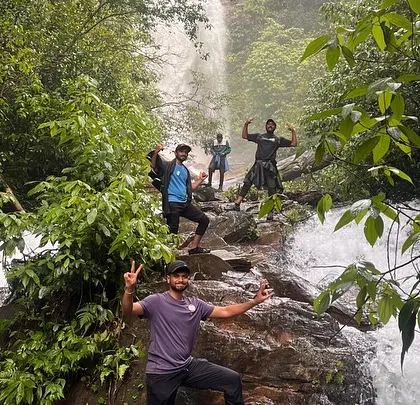 Trekkers posing at the Hidlumane falls, a beautiful spot we visit during the Kodachadri trek.