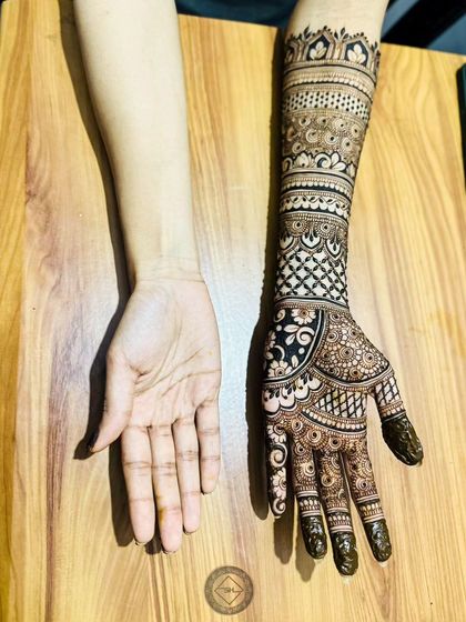 A before-and-after look at a single-hand bridal henna for Shahana. The intricate design covers the entire hand and arm with traditional motifs, showing the complete transformation.