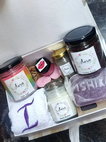This is my bestselling custom pamper hamper, perfect for any occasion. It includes a personalized towel, bath salt, Shea butter, coffee scrub, name soap, and lip scrub.