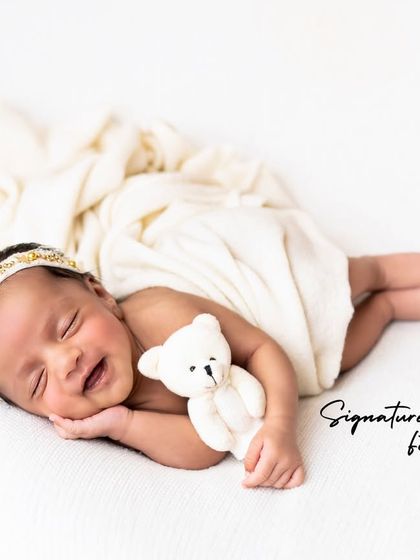 A duplicate of image 117, capturing a sweet, sleepy smile.