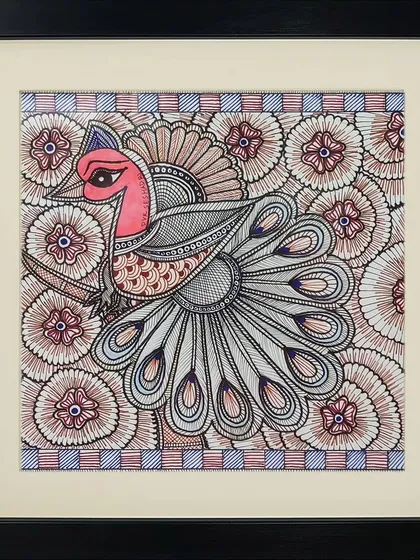 A peacock is rendered with incredible detail against a floral background in this Madhubani piece by Pramod. The fine line work in the feathers and flowers is a testament to the artist's patience and skill.