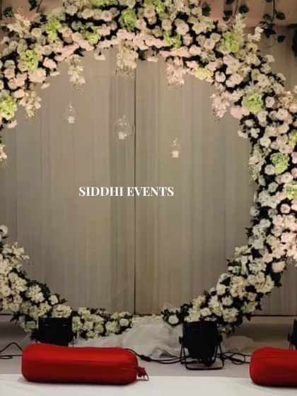 A full view of the magnificent floral circle, showcasing its scale and the intricate arrangement of white and green flowers, perfect for a grand statement.