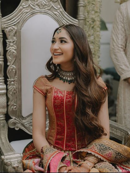 A happy bride at her Roka ceremony. I gave her soft, open waves with a center part, a timeless look that enhances her natural beauty and radiance.