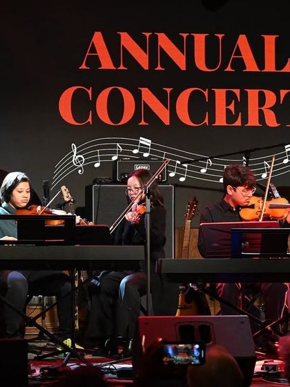 Our Violin Quartet in deep concentration during their performance. Learning a string instrument requires precision and teamwork, skills that are honed in our ensemble classes and showcased at our annual events.