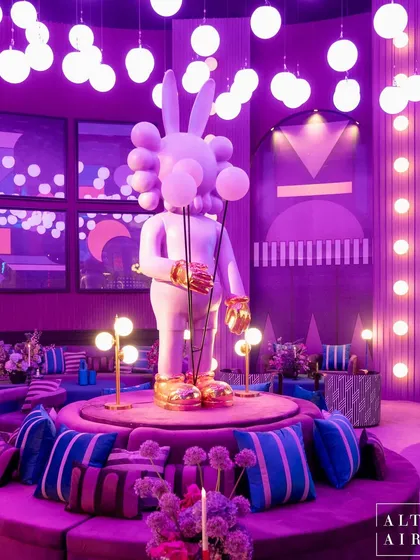 Pushing creative boundaries is my passion. For this 'Glitch Pop' event, we designed an immersive purple room inspired by Memphis Design, featuring a larger-than-life art sculpture and kinetic ball installations for a truly unconventional and artistic experience.
