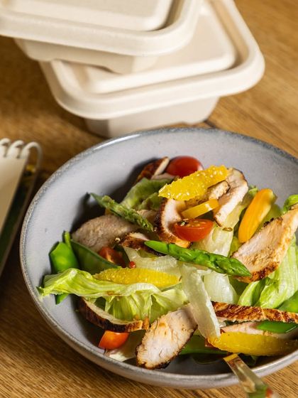 This grilled chicken salad with orange segments and snow peas is a perfect example of a light, refreshing, and protein-packed lunch. It's ideal for staying energized without feeling heavy.
