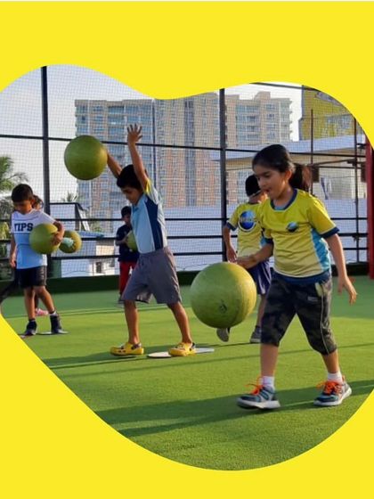 Working with different types of balls and equipment is key to our multi-sport approach. Here, kids are on the outdoor turf, practicing drills that improve their strength, coordination, and ability to handle different sports equipment.