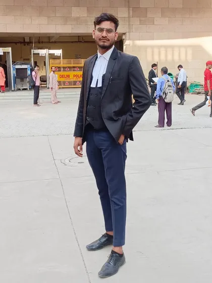 A candid photo taken in the open area of a court complex, a familiar setting for my daily work.