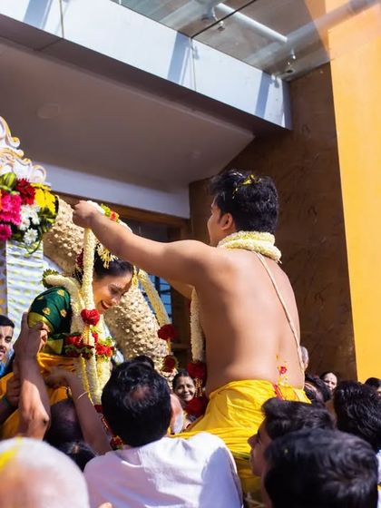 A duplicate of 206, a wide angle view of the joyous wedding ritual.