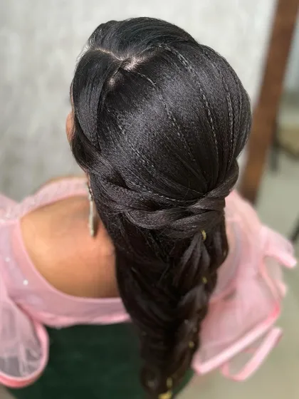 A top-down view of the mermaid braid, highlighting the tiny, intricate braids woven into the crown for added texture and detail.