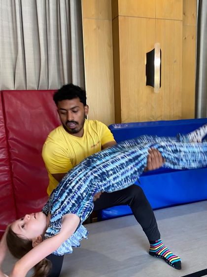 Building core strength and flexibility with a coach's support. Our gymnastics parties are a fantastic way for kids to explore their physical abilities in a safe setting.