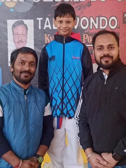 Celebrating a gold medal win in the sub-junior category at the Delhi Olympic Games. We focus on building a strong foundation for our youngest competitors.