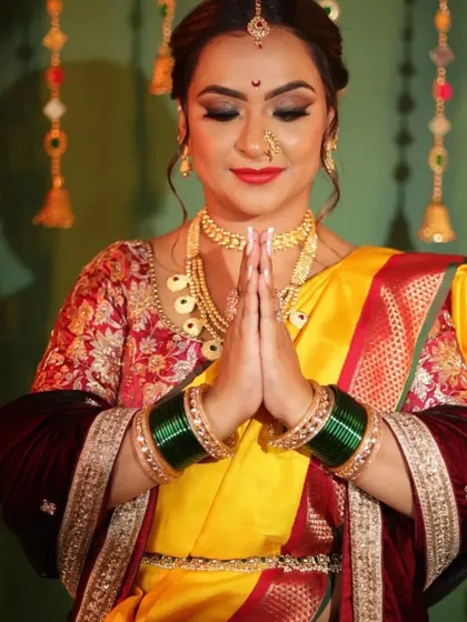 A festive look for Ganesh Chaturthi. This client is wearing a traditional yellow Nauvari, and I ensured the drape was perfect for her to comfortably participate in prayers and celebrations.