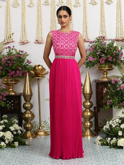 A similar style in a stunning hot pink, this Bandhani dress is perfect for making a bold and beautiful statement.